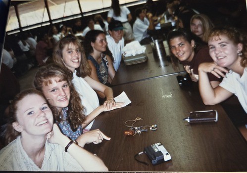 Girls sitting in old Dining Hall.