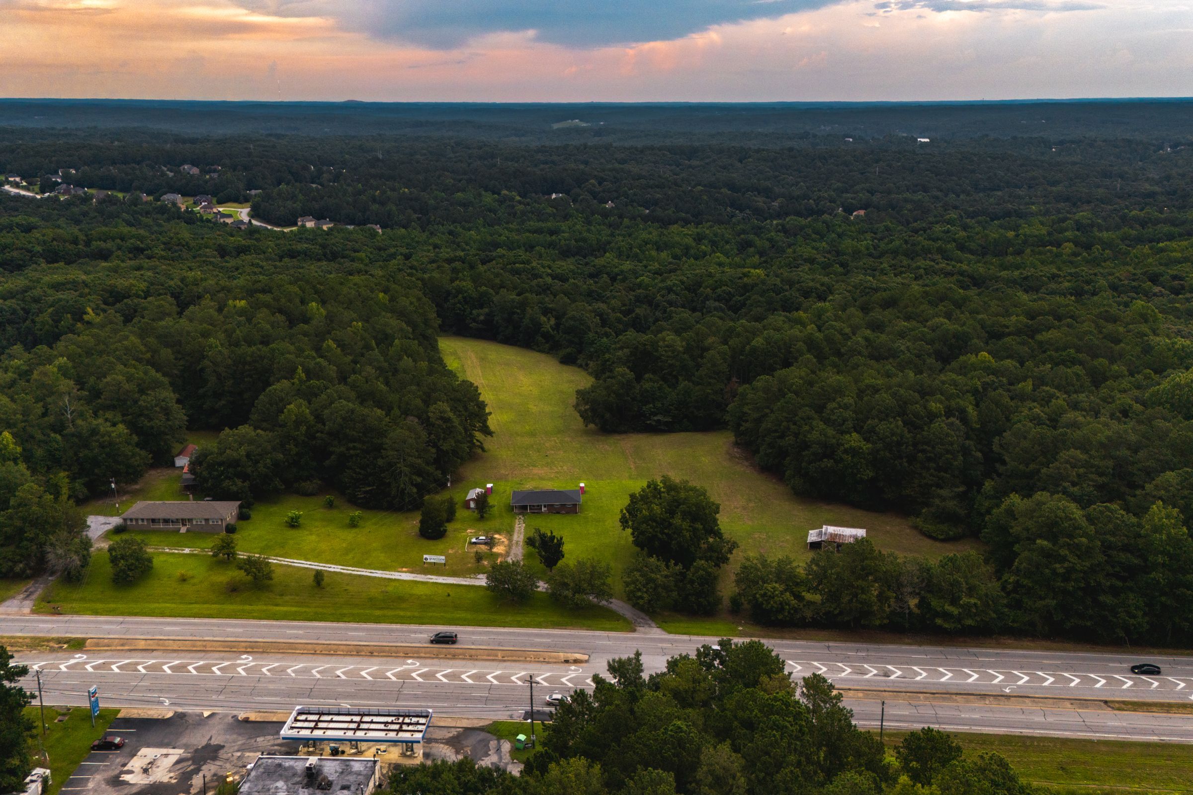 Aerial view of the open land for the new Graystone Church Monroe campus along Highway 78