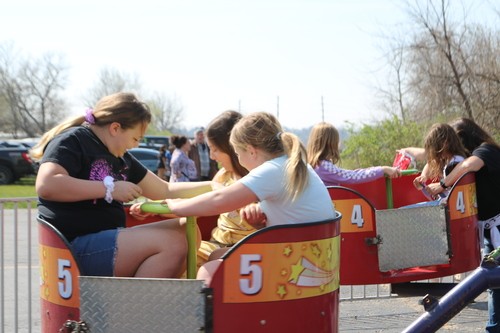 Kids enjoy the tubs of fun while they wait for Egg Hunt to begin at New Life Church in Oak Grove, MO