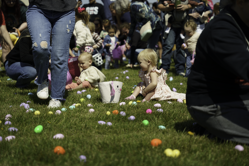 Girl enjoys an inflatable at New Life Church in Oak Grove during the annual Egg Hunt.