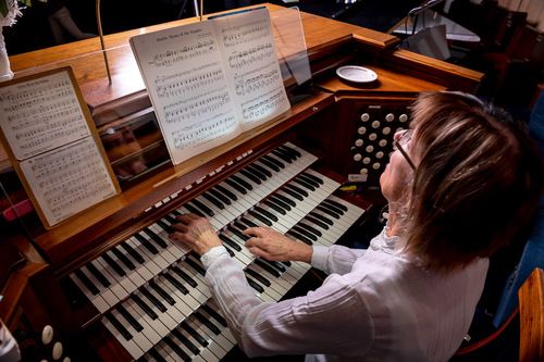 Image of Dr. Rochelle Parker playing the sanctuary organ.