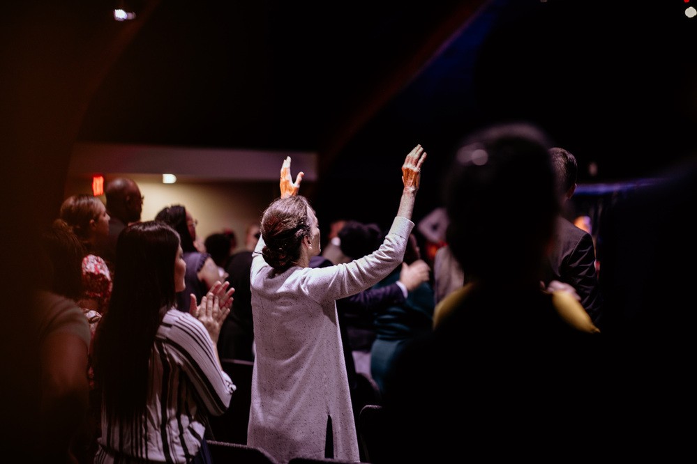 People worshiping during a Sunday service