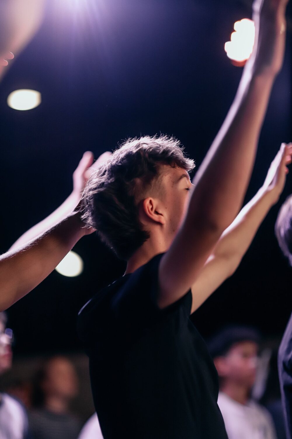 Students worshiping at NextGen