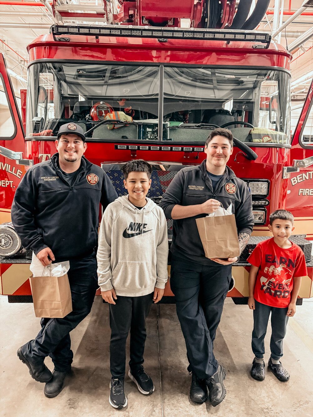 Delivering gift bags to local firefighters