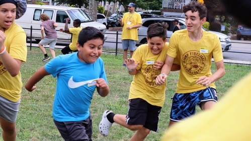 Kids enjoying Vacation Bible School games at Calvary Life Church in Brooklyn