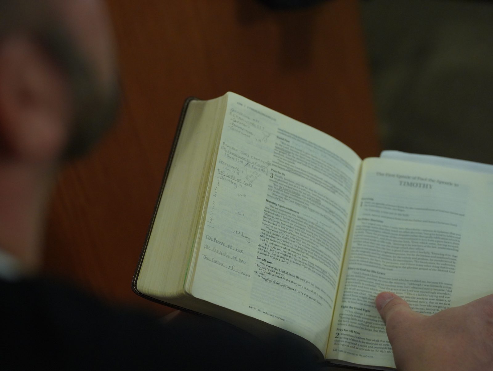 An open Bible on a table during a teaching service at Calvary Life Brooklyn