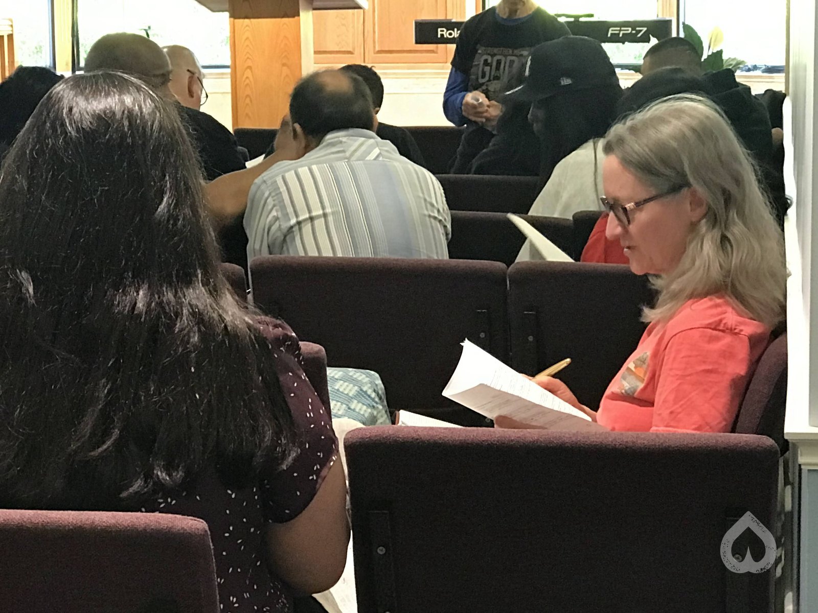 Taking notes during a Bible study at Calvary Life Brooklyn