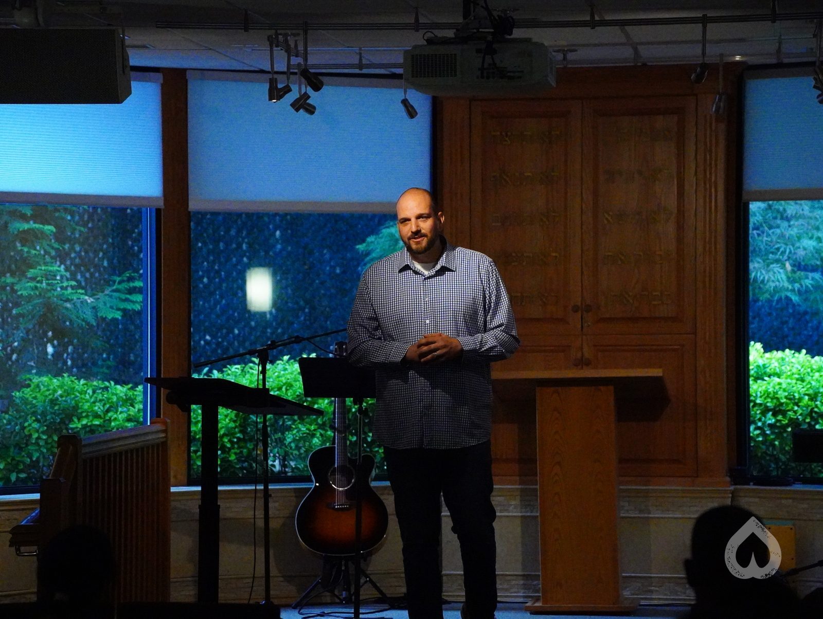 Pastor teaching from the podium at Calvary Life Brooklyn