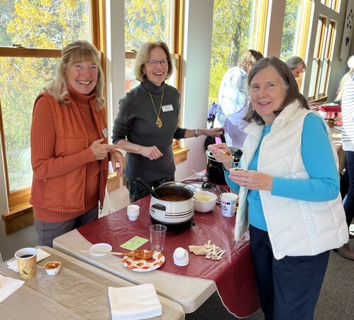 Serving and sampling chili at a chili cookoff