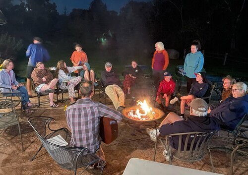 Singing around the campfire at a camp-in