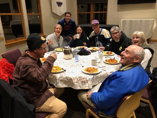 Table of friends at Loaves & Fishes dinner