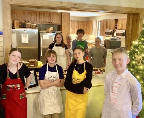 Group of teen servers at Christmas brunch
