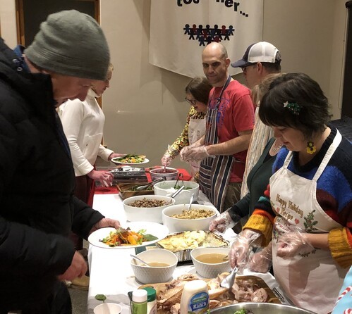 Serving Loaves & Fishes Thanksgiving meal