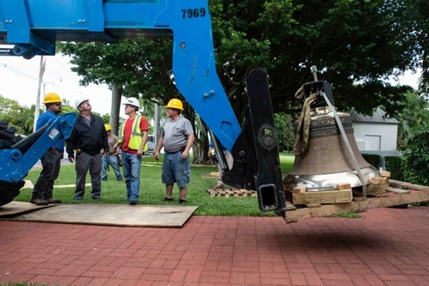Bell being lifted into the steeple