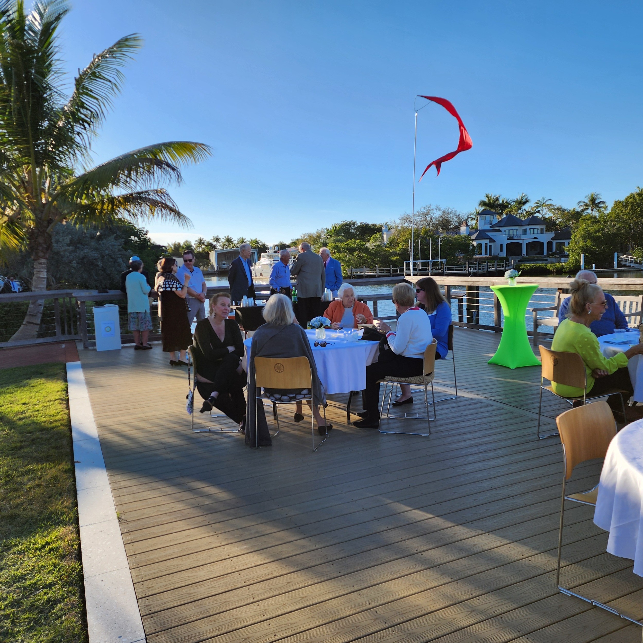 Guests enjoying dinner on the waterfront