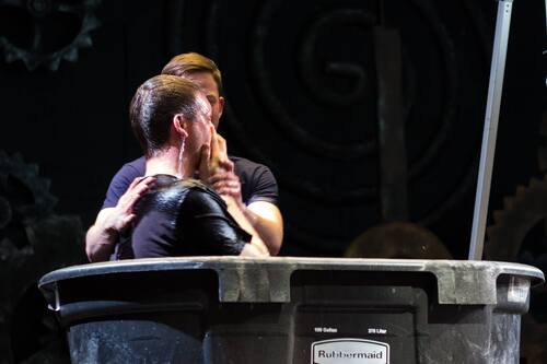 Baptism taking place during a worship service at Restoration City Church, symbolizing new life in Christ.