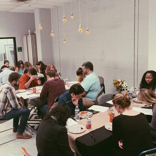 New attendees participating in Restoration City Church&rsquo;s Starting Point lunch to learn about the church&rsquo;s mission and community.