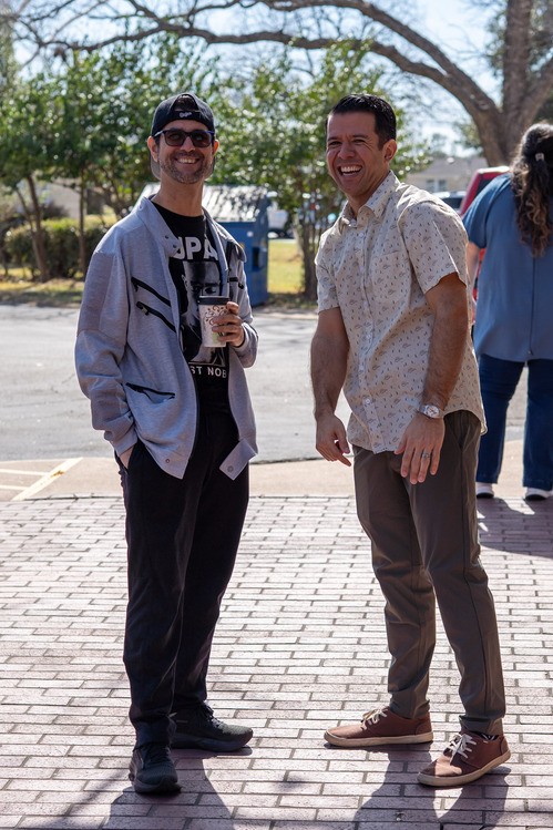 Church elders walking together outside Awaken Church, a non-denominational church in Round Rock, TX