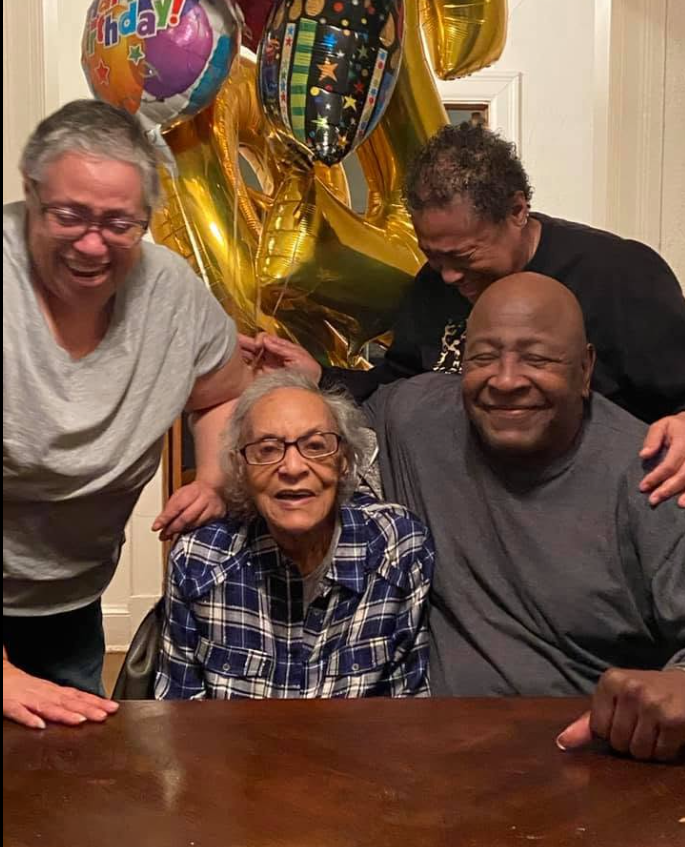 Darlene celebrating with family
