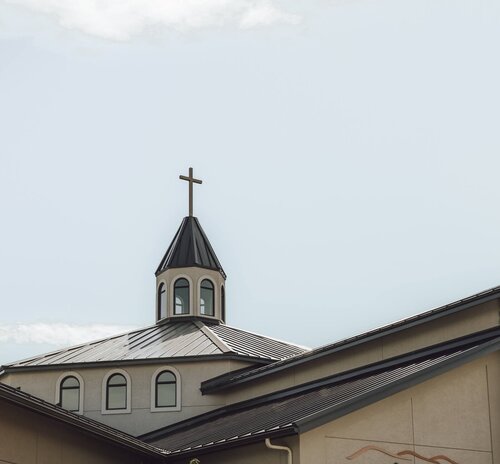 The steeple and cross on top of Southridge Church