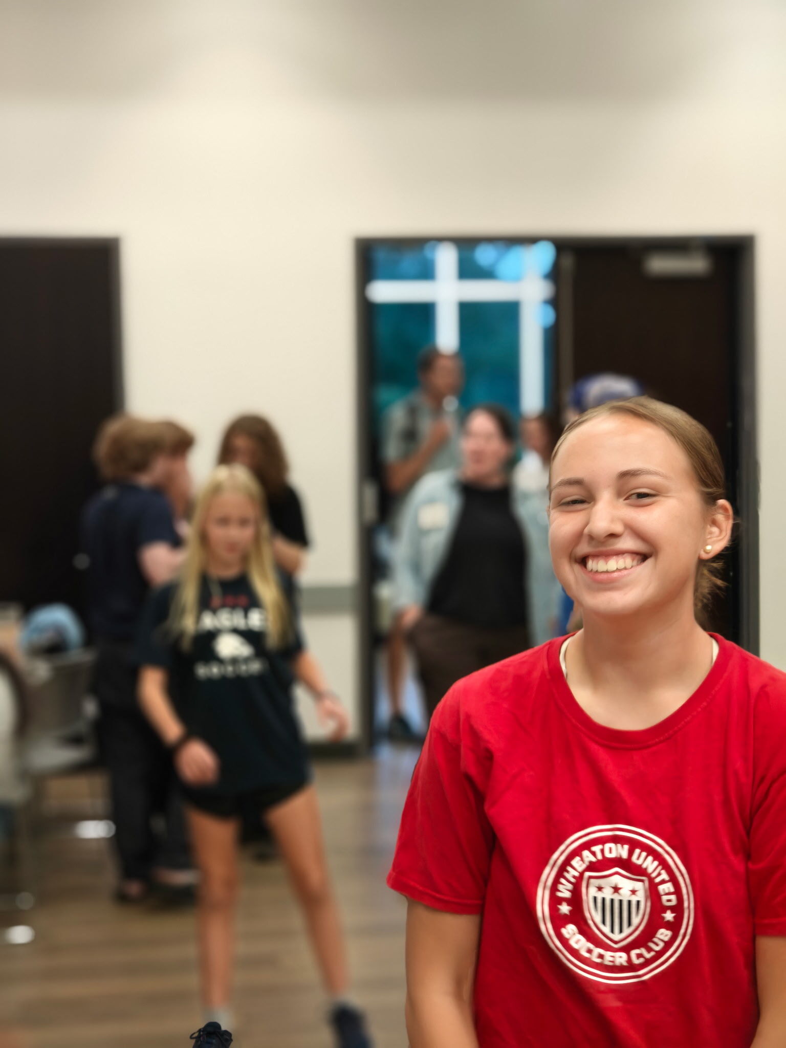 Student leader smiling at Renewal Students