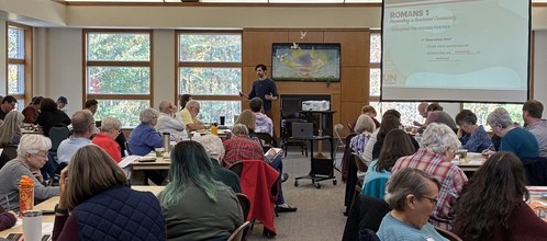 Author and pastor Colby Martin presenting at the Unclobber workshop in November 2025.