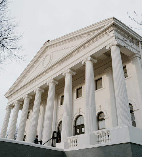 Black and white photo of the outside of the Vertical Church building