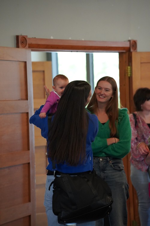 Friends connecting before Sunday church service at LifeSwitch in New Zealand.
