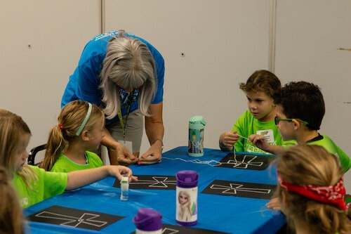 Kids doing crafts at VBS