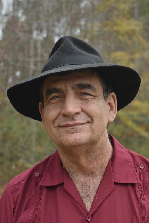 photo of man with black hat