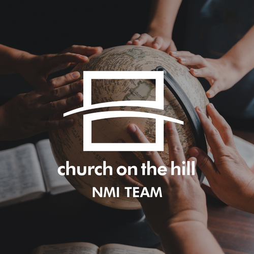 Photo of hands on the globe at Church on the Hill