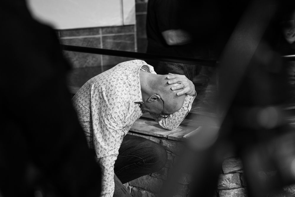 A person in prayer at Christ Fellowship Church