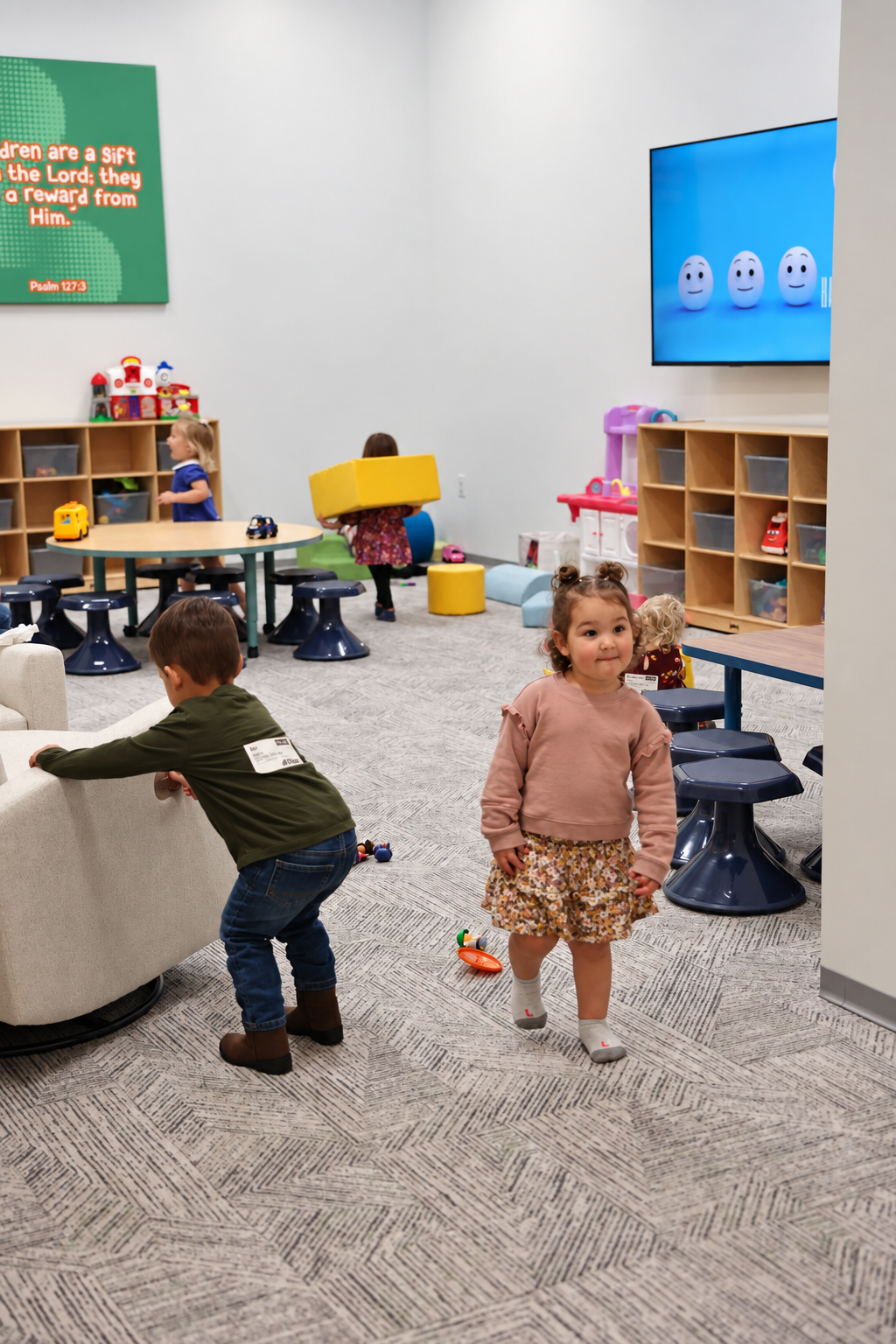 Young children playing in the CFlittles classroom