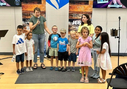 Praying for our kids before Kid's Church at Equipped Church in Highlands Ranch CO