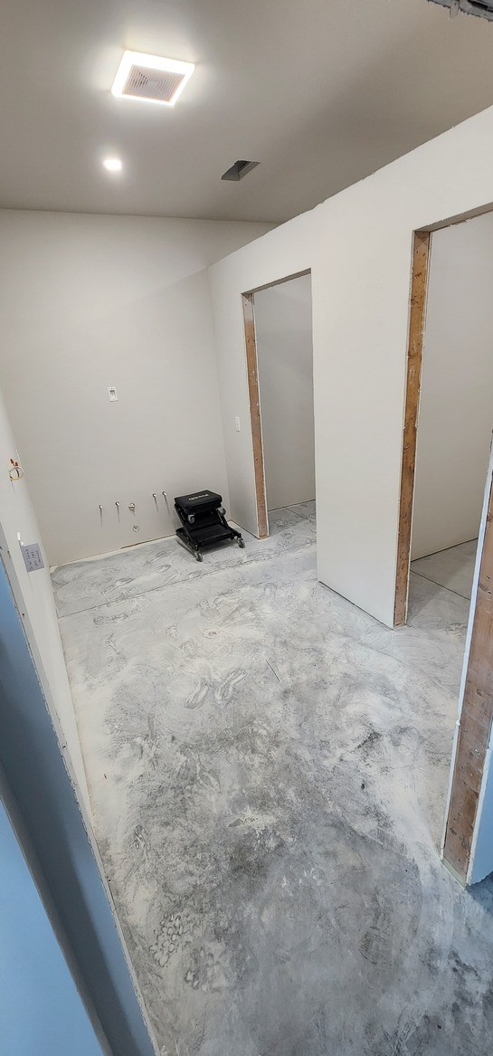Construction progress on the lower-level men's restroom