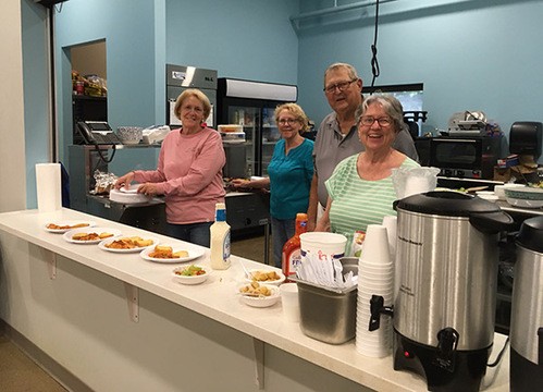 Parishioners regularly volunteer to serve meals at the Emergency Shelter of Northern KY.
