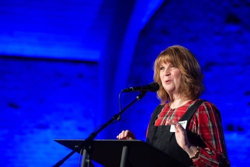 woman speaking at a women's conference