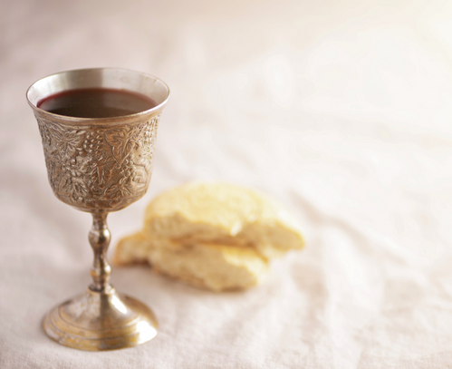 Communion cup and bread