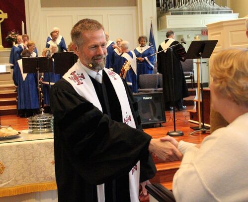 Communion cup and bread