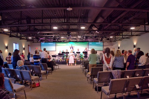 Picture of a pastor in front of the congregation