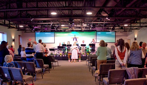 Picture of a pastor in front of the congregation