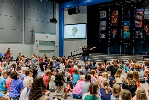 4 elementary school girls enjoying crafts during small group at first redeemer church children's church