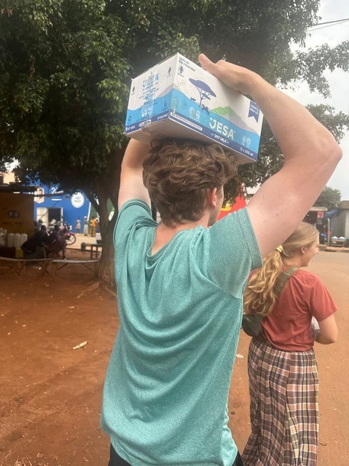 Young adult using his hands to serve on mission