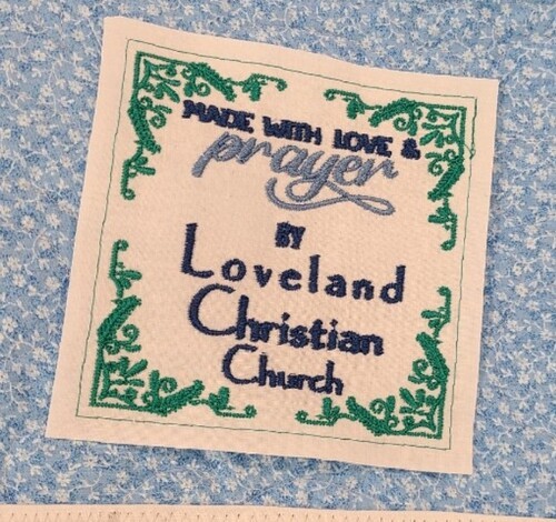 Sewing to Serve label - Made with love and prayer by. Loveland Christian Church