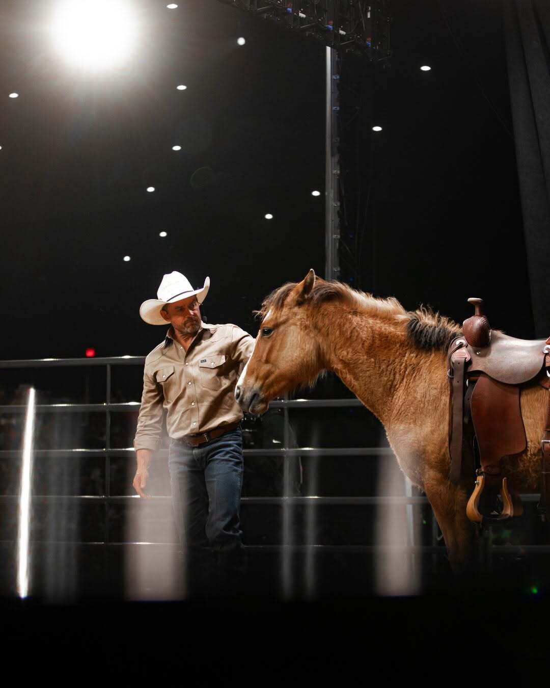 Todd Pierce working with a horse during a Riding High Ministries event