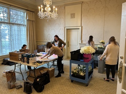 volunteers prepare for an event with Peaceful Family Oklahoma