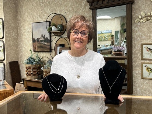 Robin at jewelry case