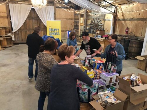 Volunteer supporting cancer patients through local charity program